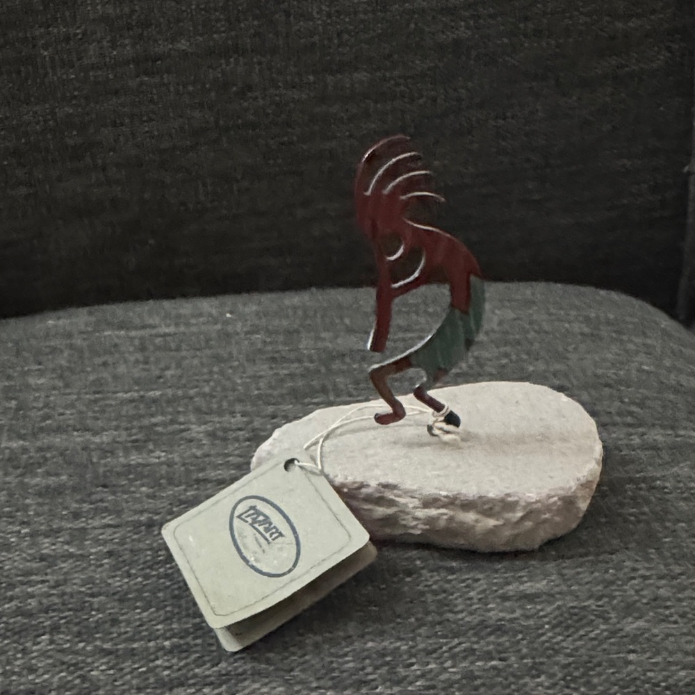 Metal Kokopelli Sculpture on Stone Base